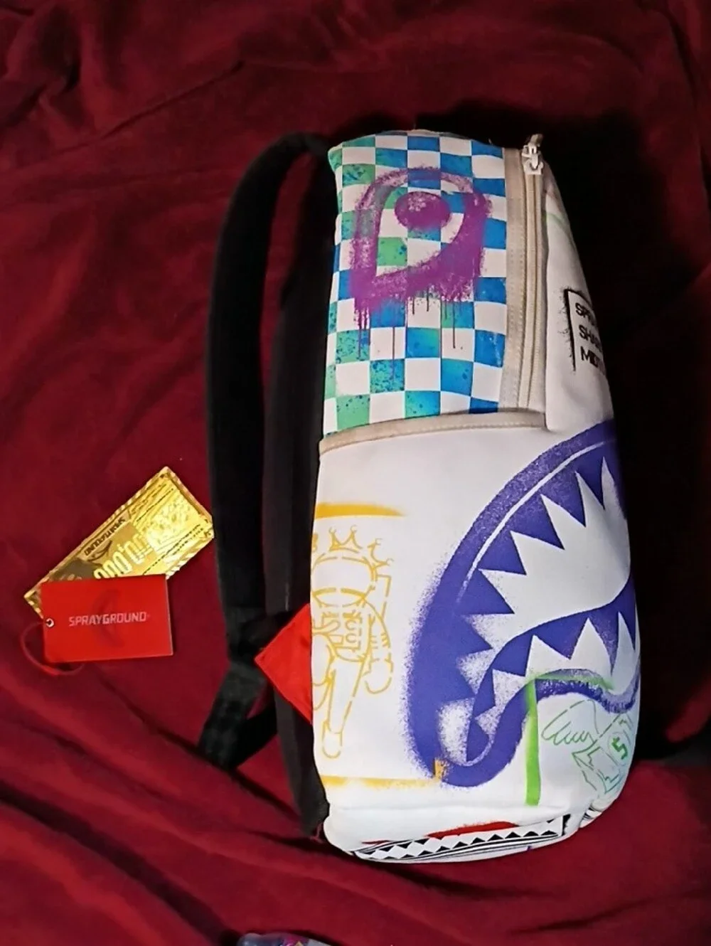 Sprayground White Backpack with Purple Shark Graphic and Green Money-Bag Accents